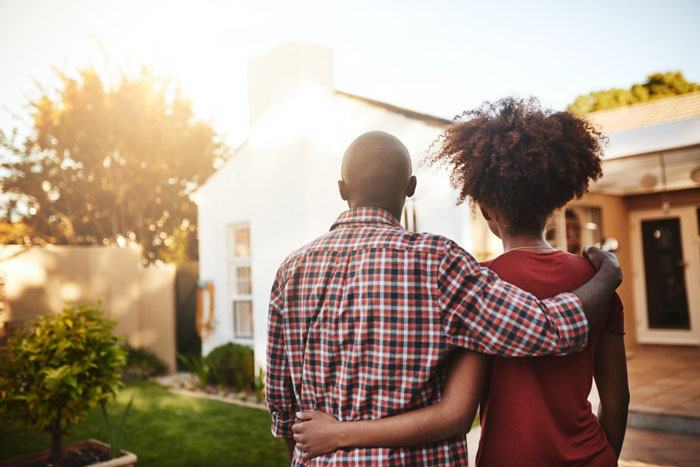 A couple looking at their first home.