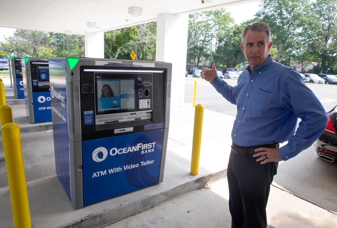 Chris Maher CEO showing the Video Teller Machines